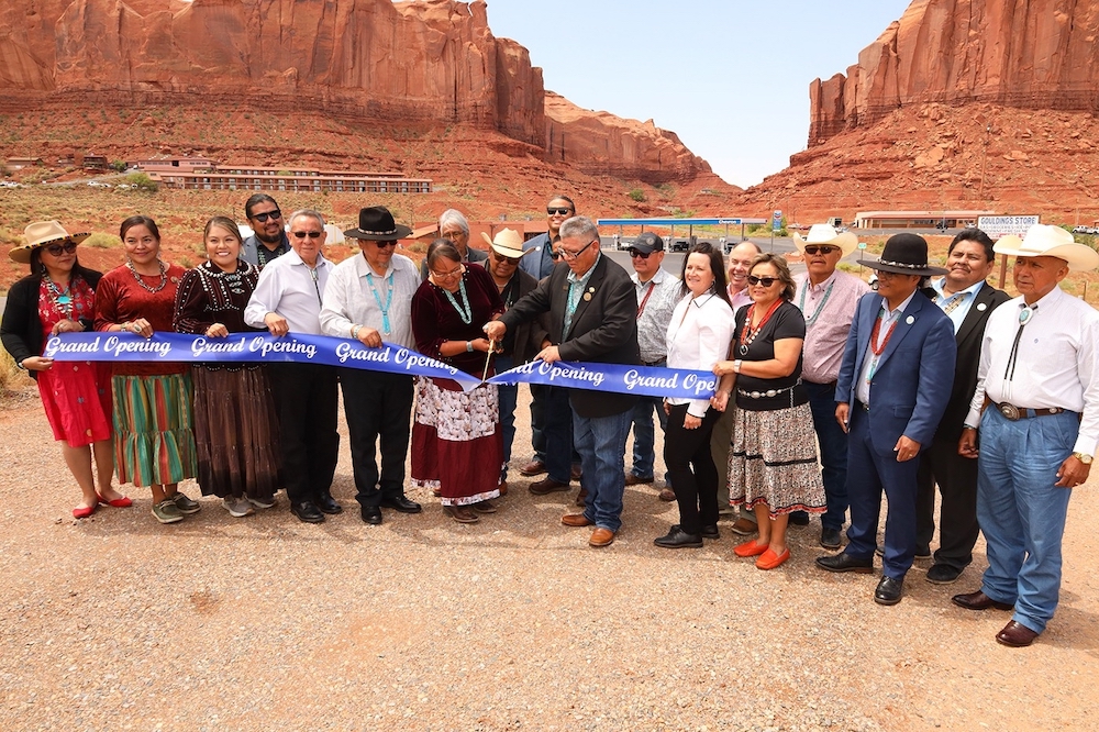  Members of the Navajo Nation Hospitality Enterprise Board, 25th Navajo Nation Council, Navajo Nation President Dr. Buu Nygren, and the Navajo Land Department stood together at the grand opening of the Goulding's Lodge. (Courtesy photo) 