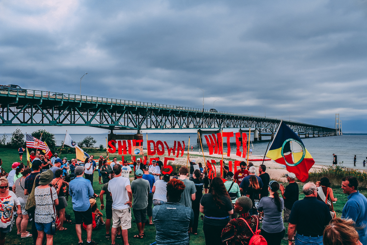 People protesting near Mackinac Bridge